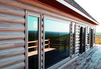 Металлический сайдинг блок хаус бревно в Днепропетровске